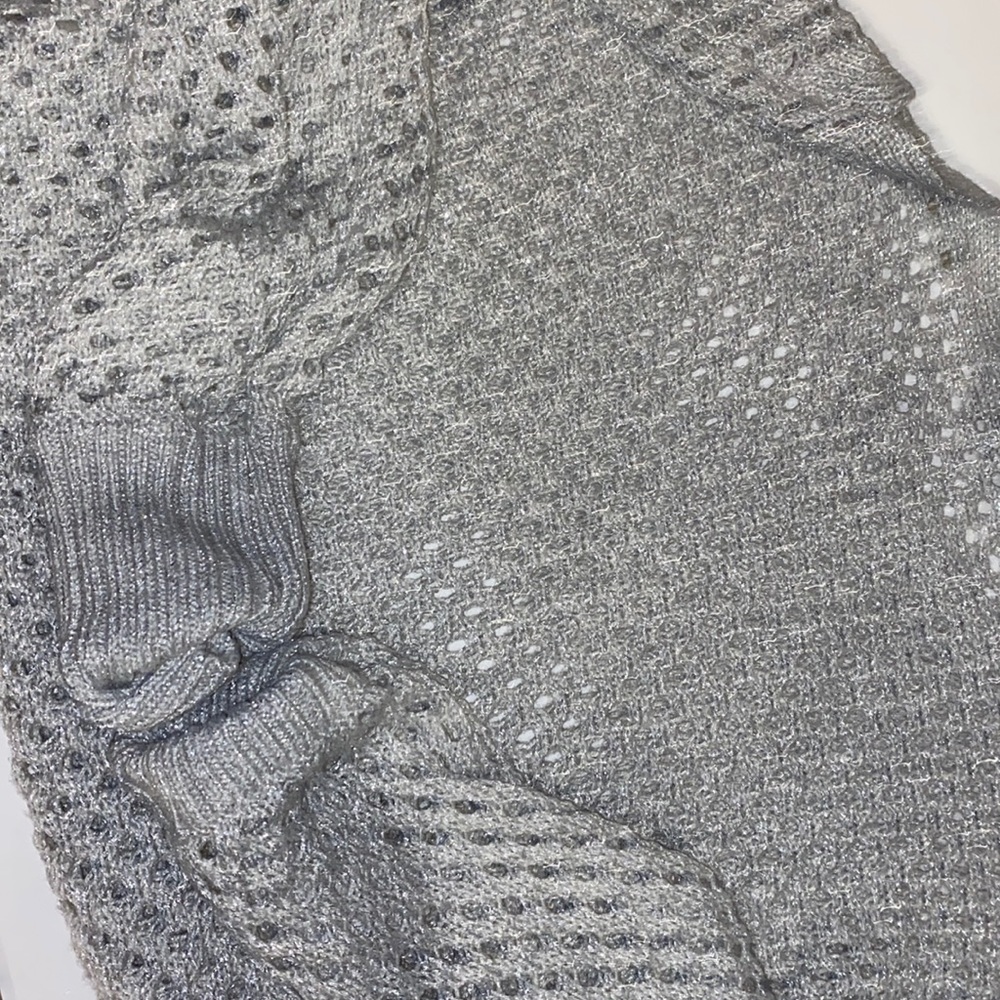 Sweater with wholes you can put any shirt under it
